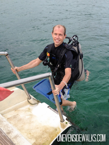 Landon Climbing up Dive Boat